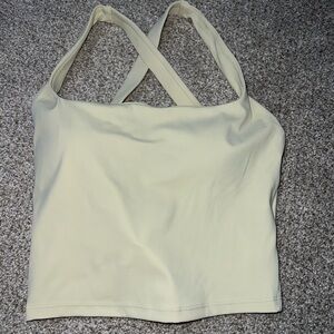 Very light yellow top with built in bra, open back